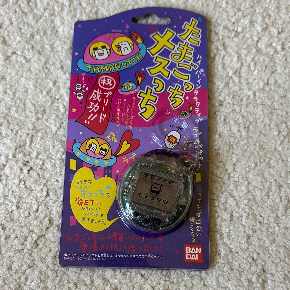 Bandai Tamagotchi Digital Pet - Clear Gray